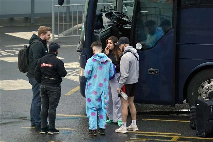 Passengers by their coach in Dover (Gareth Fuller/PA)
