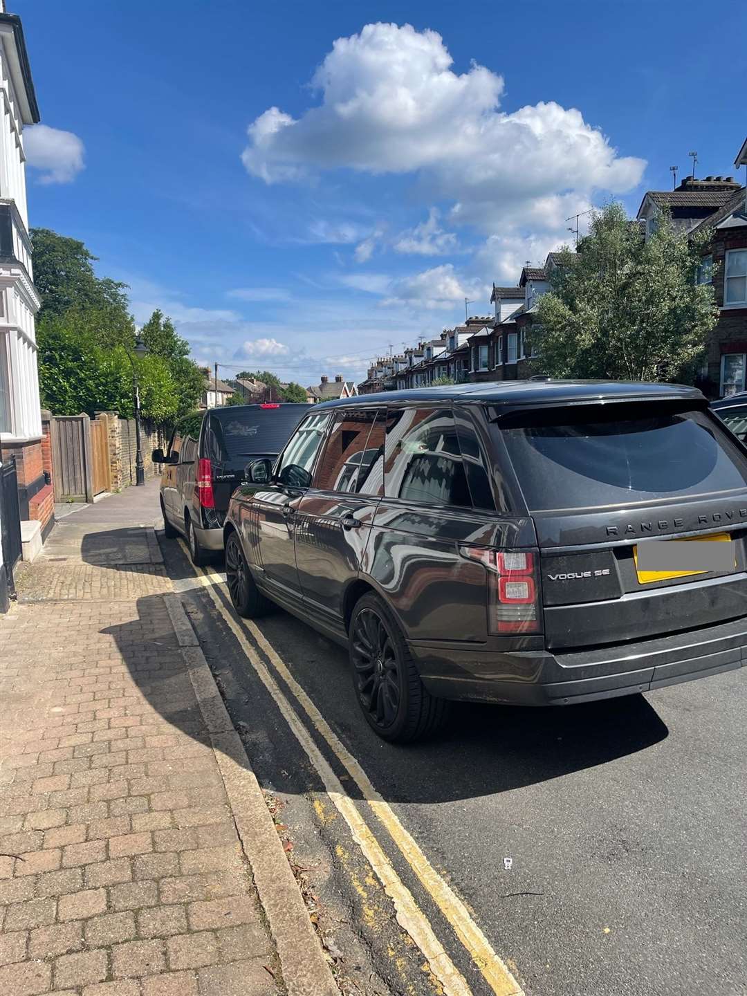 Cars parked on double yellows in Roebuck Road, Rochester