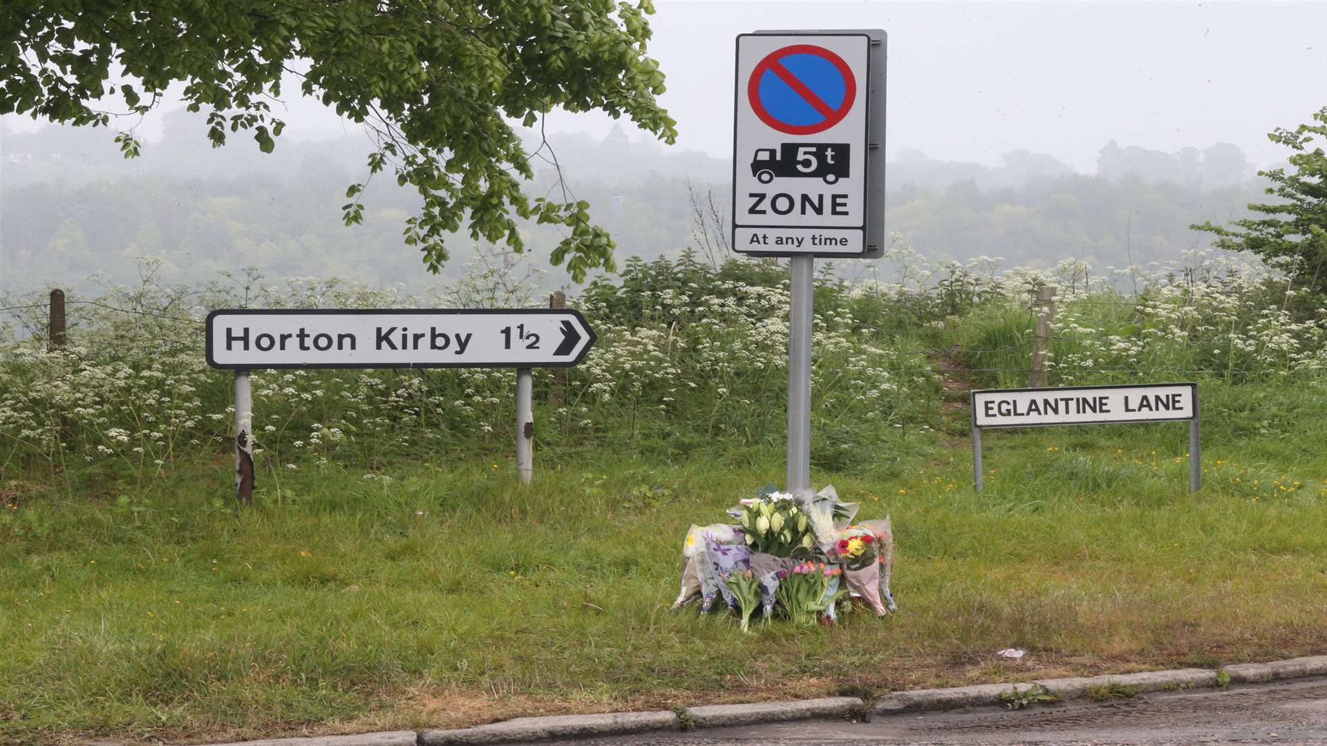 Flowers mark the spot of a fatal accident in Farningham at Eglantine Lane, off the A20 going towards Horton Kirby
