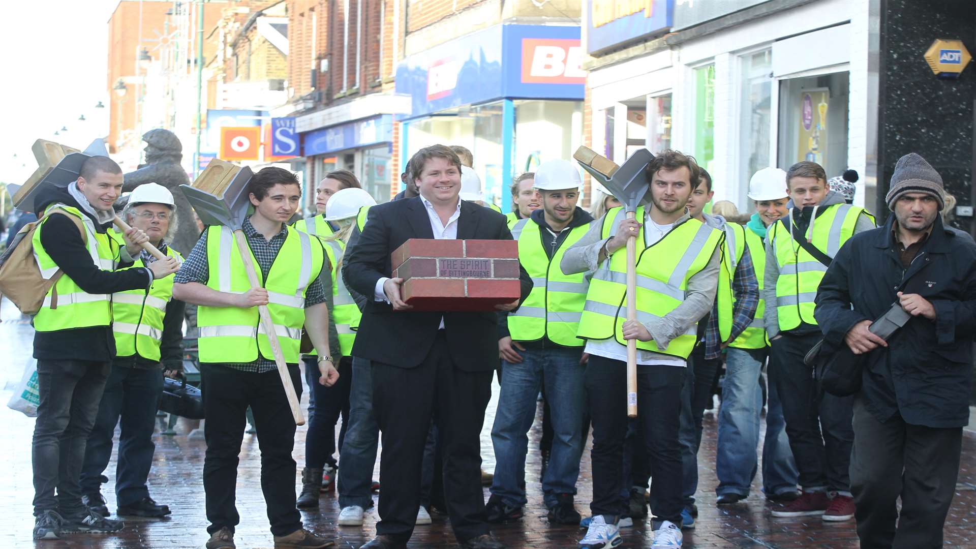 Fergus Pryor, development manager from the Cathedral Group, led a group of bricklayers down Sittingbourne High Street