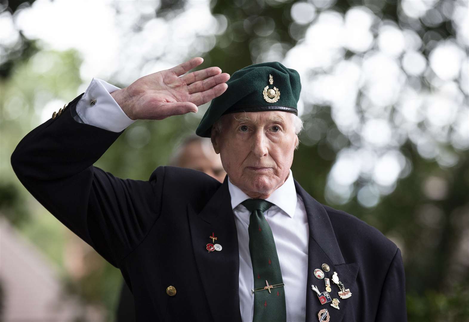Former Royal Marine, George Bradford saluting his carers. Picture: RBLI