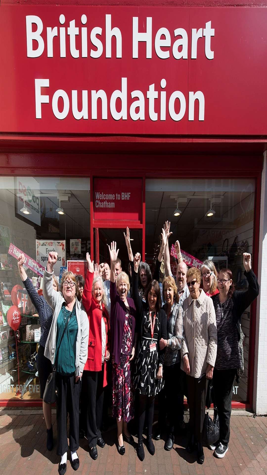 Staff and volunteers celebrate 25 years of Chatham charity shop