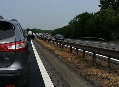Queues are backing up. Picture: @Andy_Haynes83.