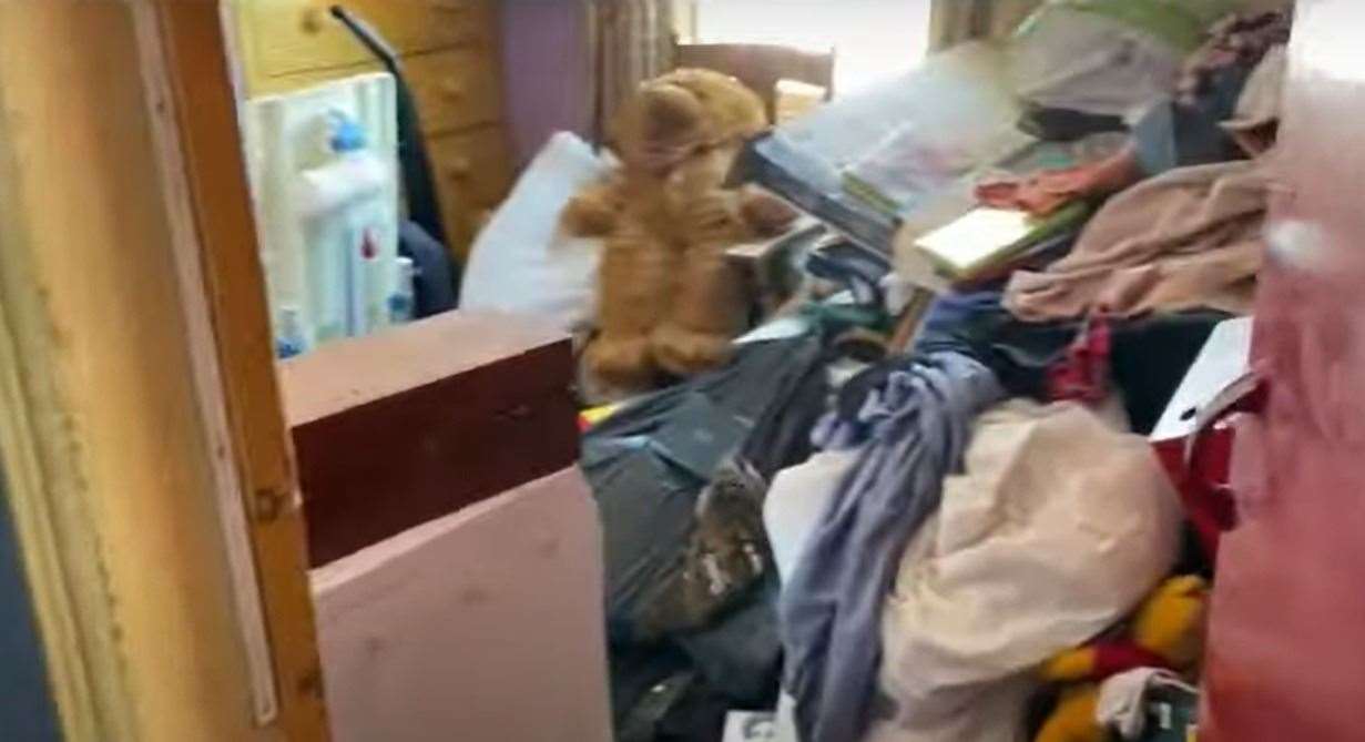 A room on the first floor full of personal belongings.  Image: Clive Emson / YouTube