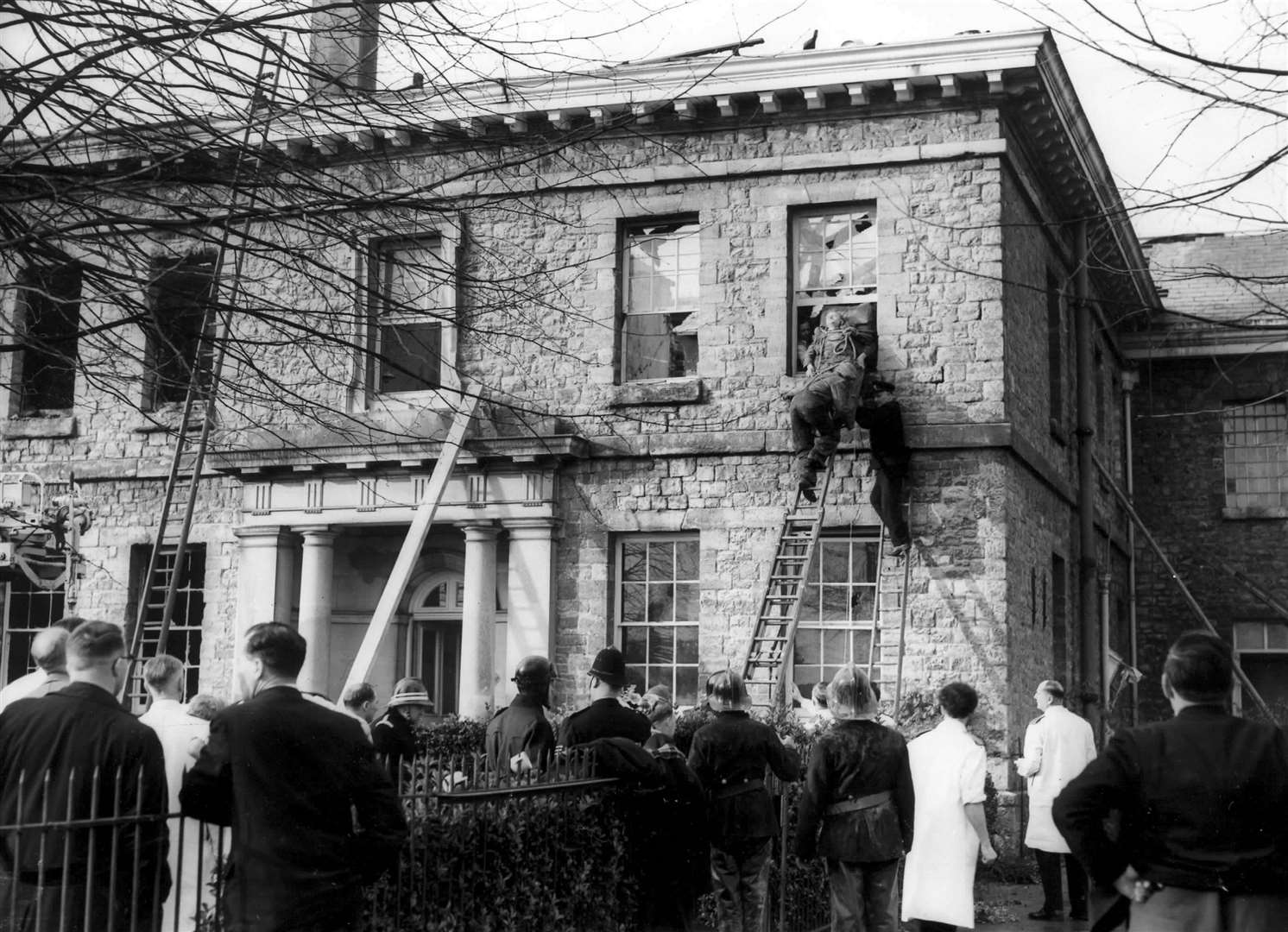 Rescue operation during a fire at Oakwood Hospital in 1957, where seven people were killed when a tower collapsed