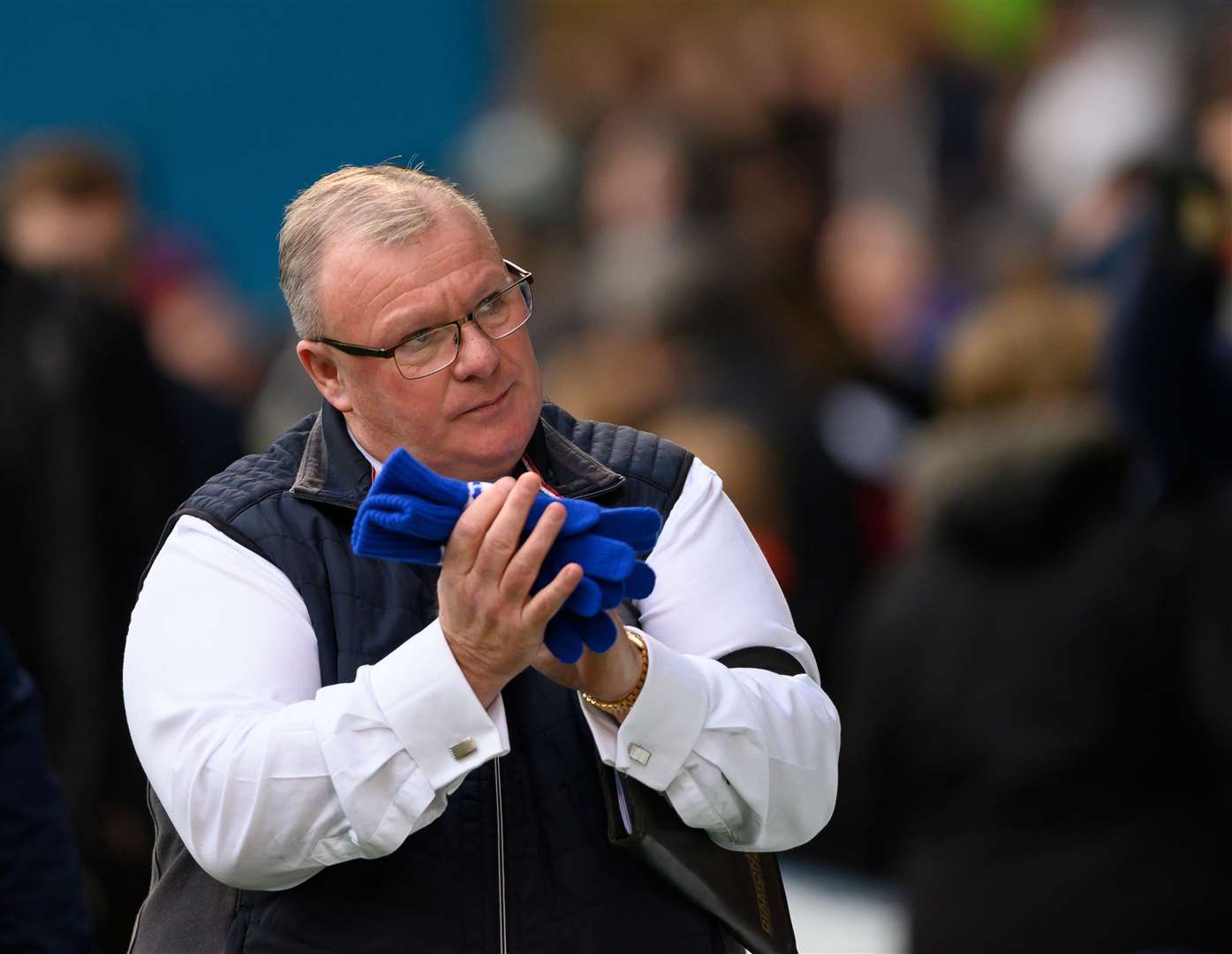 Gillingham manager Steve Evans says he left Sincil Bank with a wry smile on Tuesday night