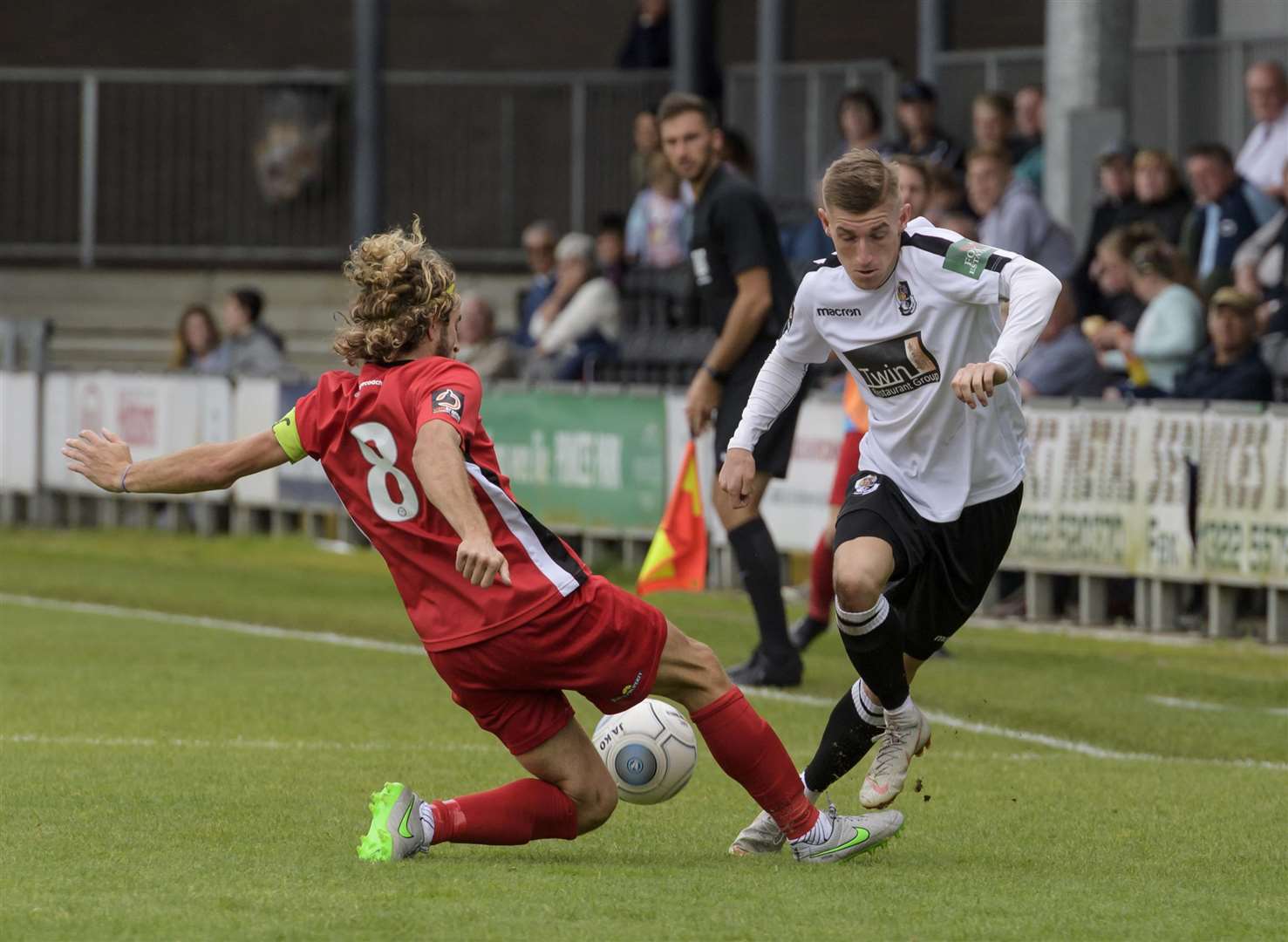Tom Knowles takes on Sergio Torres during Dartford's 2-2 draw with Eastbourne Borough Picture: Andy Payton