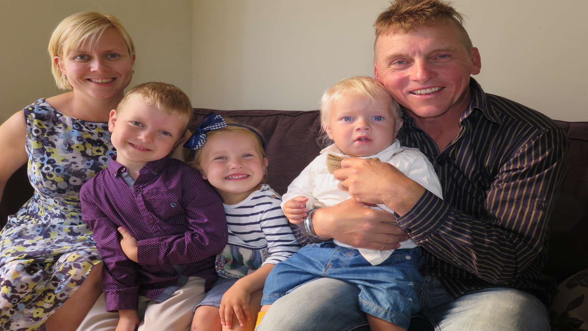 Tony and Larisa Caplin with their children Emlyn, 5, Ramashka Buttercup, 3 and Charlie, 18 months