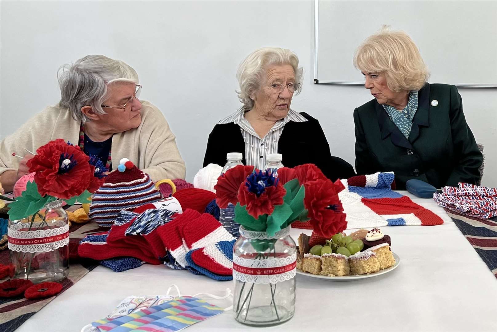 Yvonne Goodwin, Pearl Small and the Duchess of Cornwall talking about knitting at Sheerness Healthy Living Centre