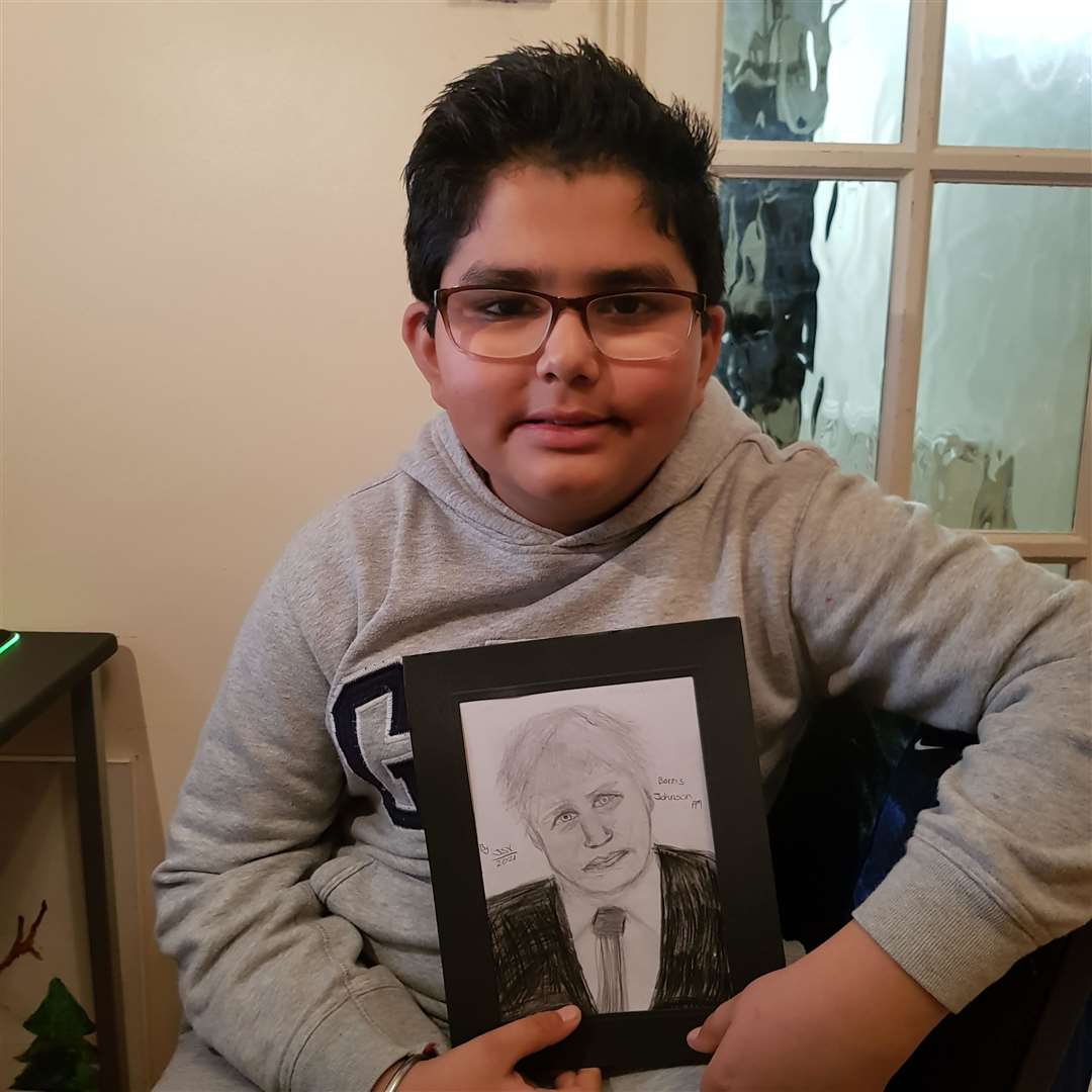 Jeevan and his portrait of Boris Johnson