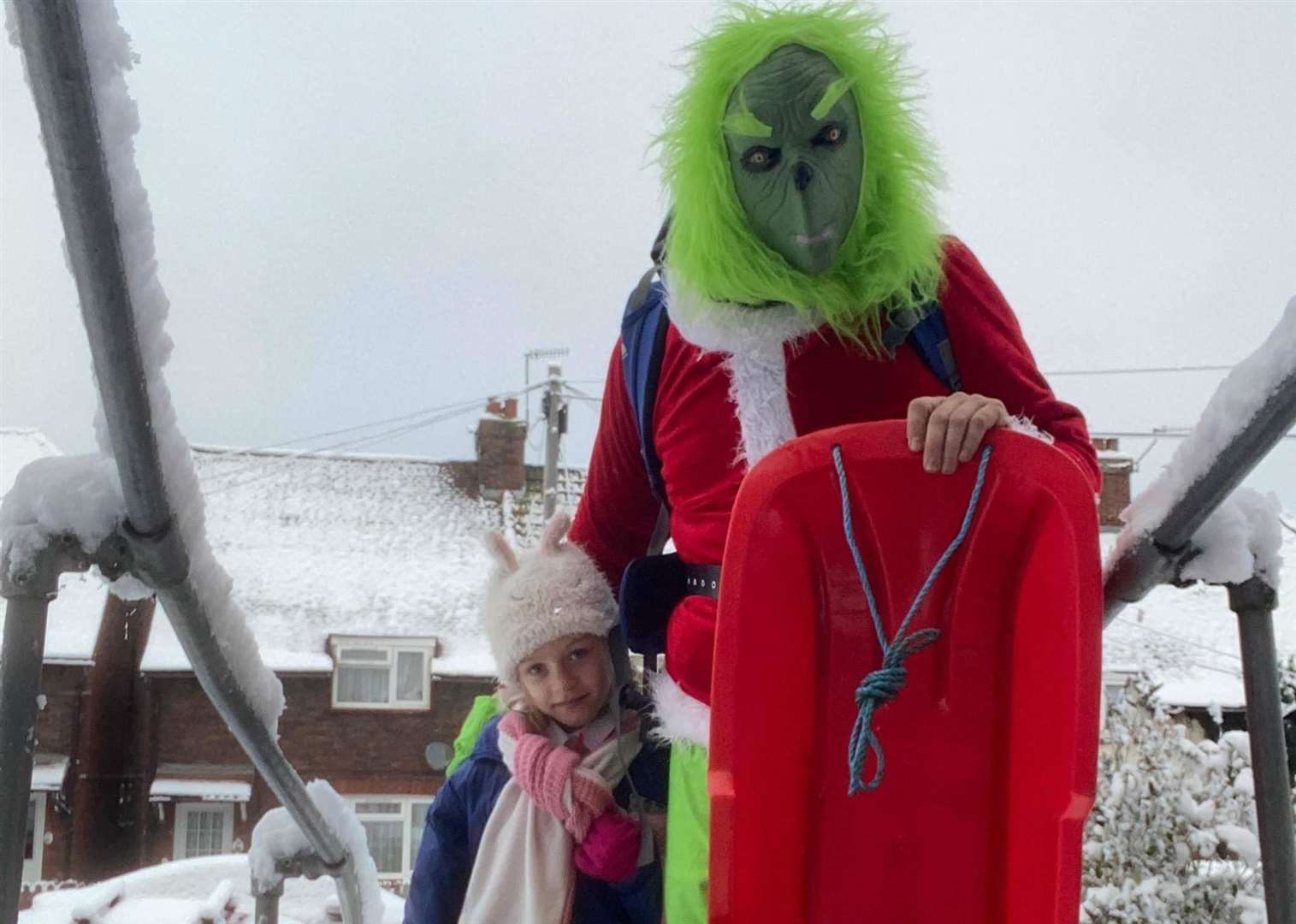 Daniel Wood as the Grinch with his daughter, Isabella