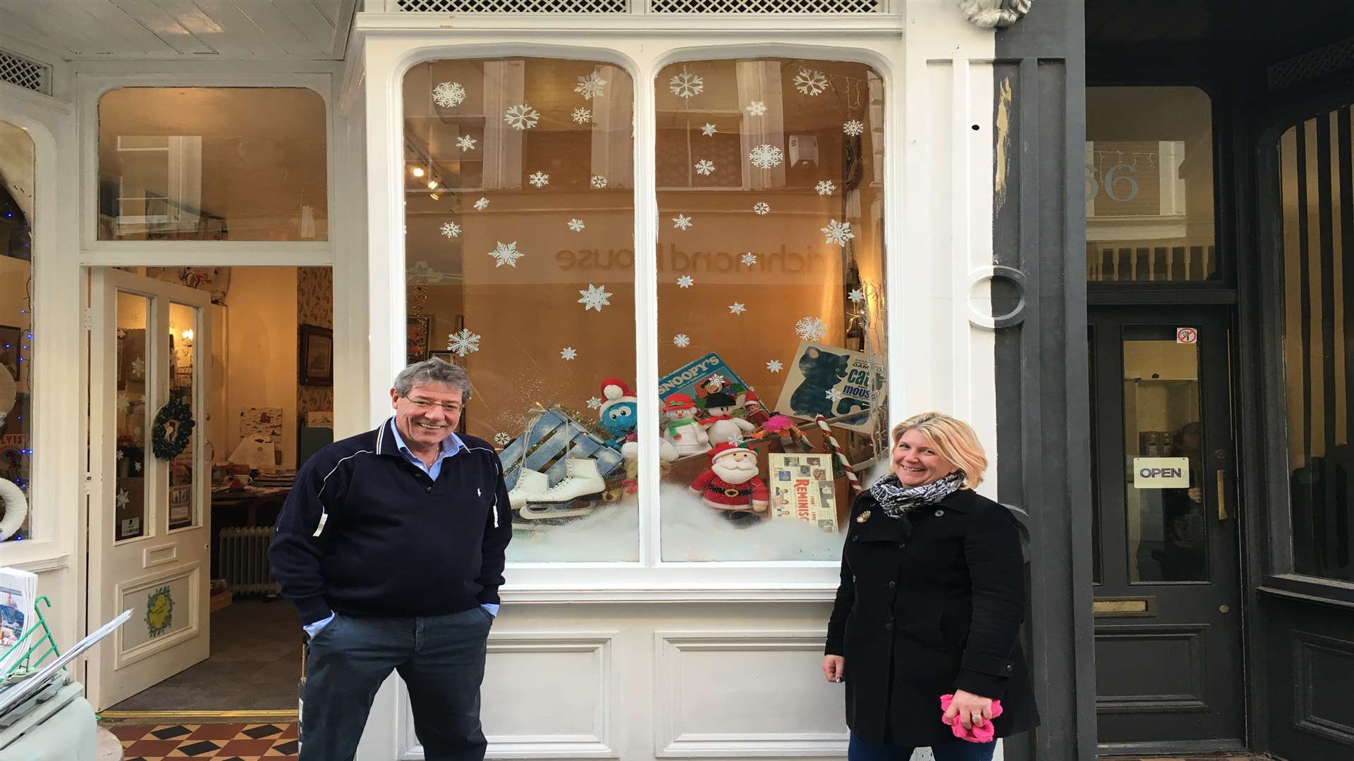 Owner of the Forget-Me-Not vintage and craft store, Sarah Cheshire (right) and colleague Richard Bastow (left), pictured in front of their festive window