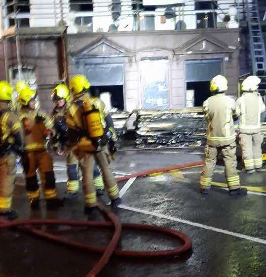 Firefighters at the scene of the blaze in the early hours. Photo: Lisa Carron
