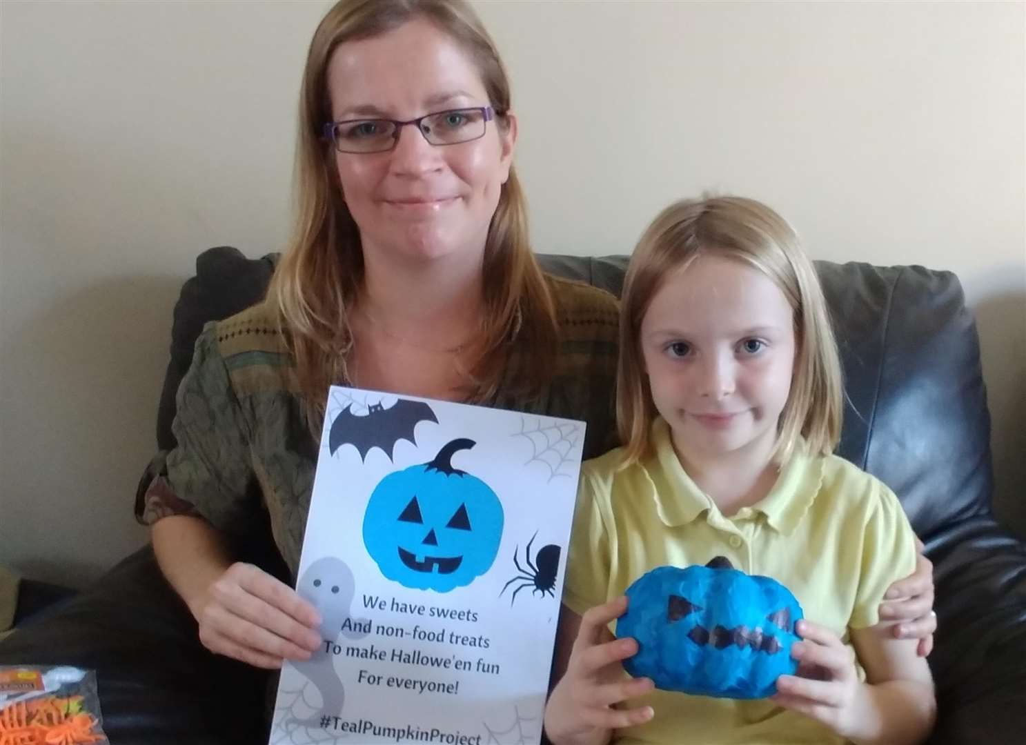 Zoe Williams with her daughter Kayleigh and their teal pumpkins