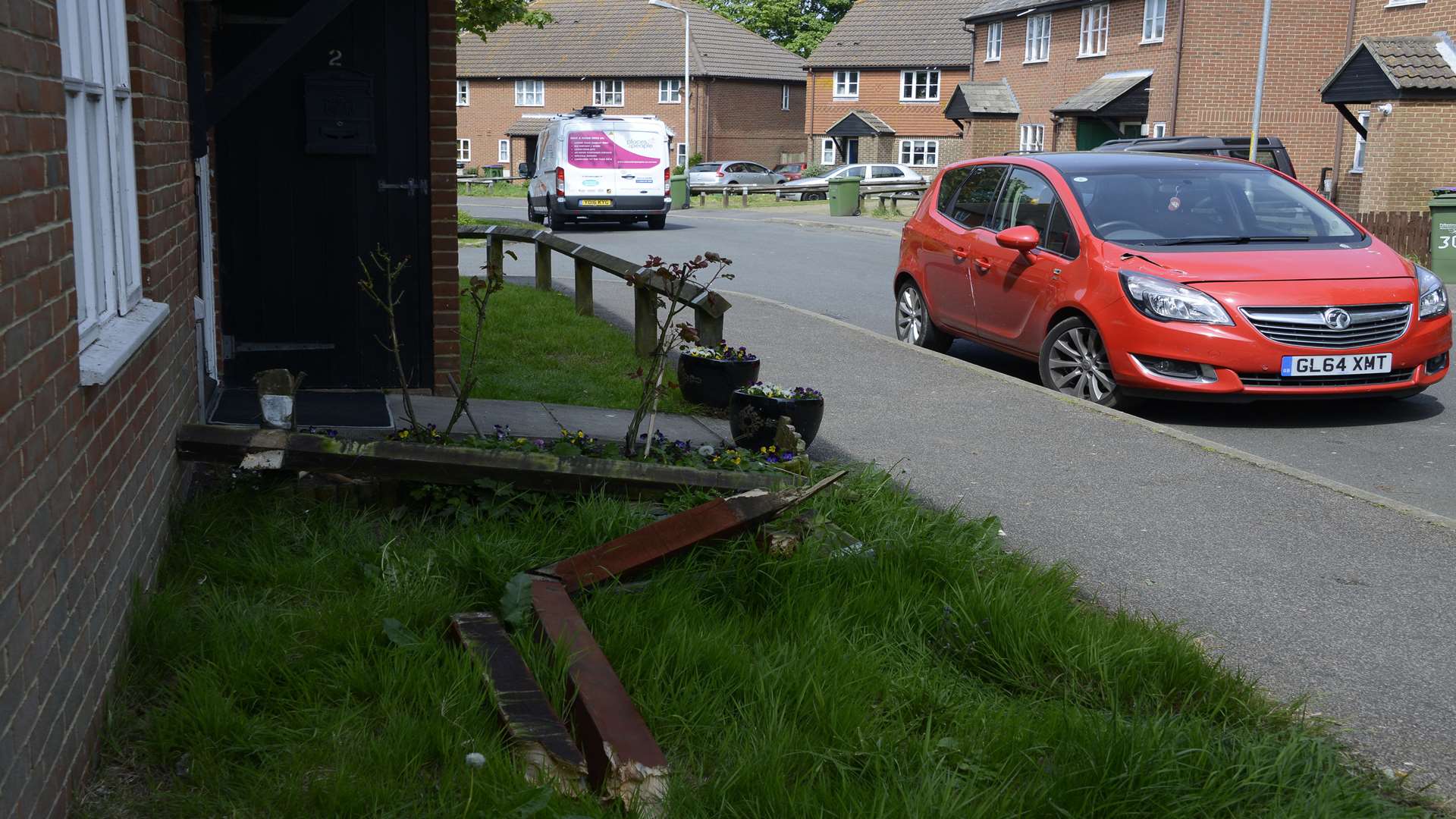 The dustcart smashed through a fence and hit the house. Picture: Paul Amos