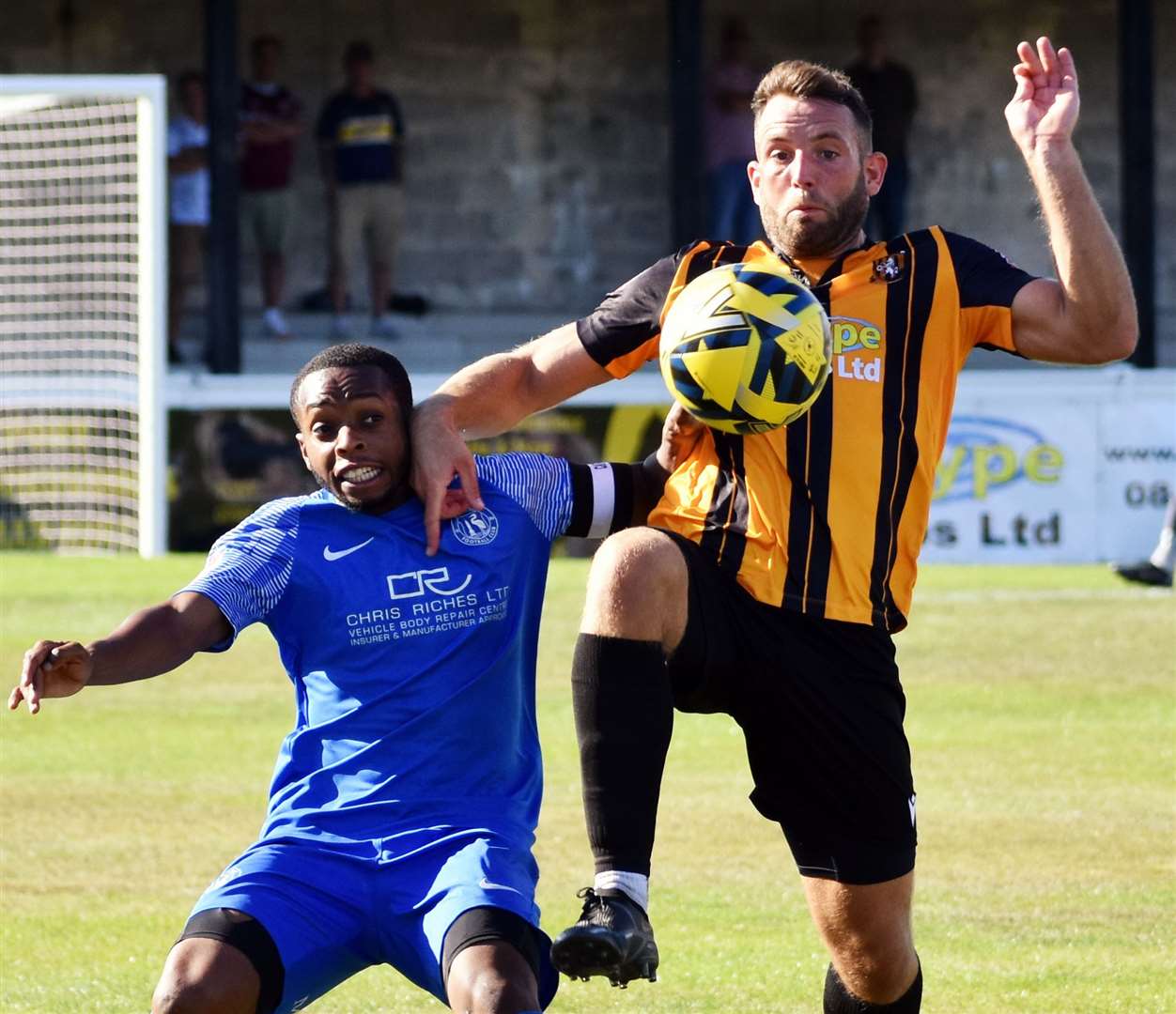 Folkestone's Josh Vincent and Herne Bay captain Kieron Campbell battle it out. Picture: Randolph File