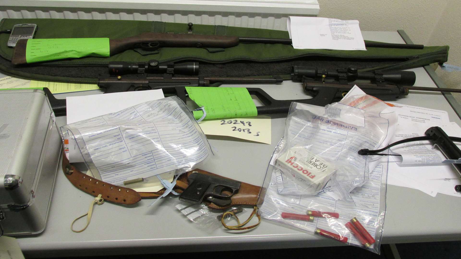 Firearms and a crossbow were seized during a raid in Faversham