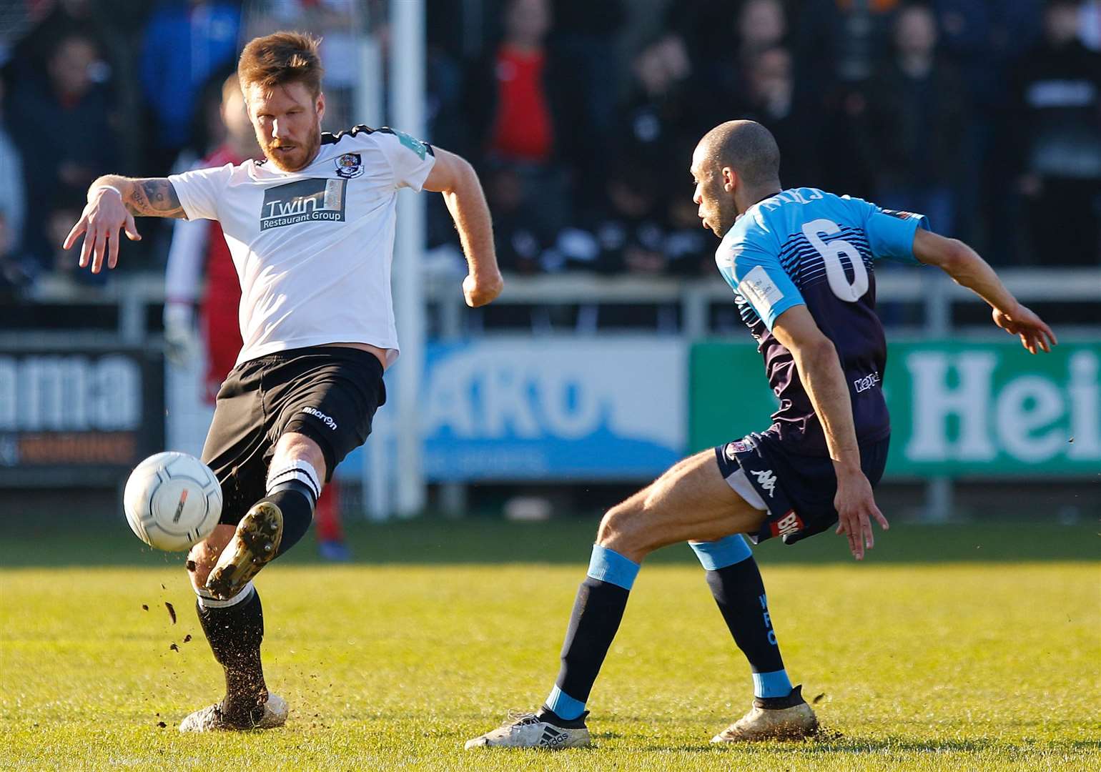 Elliot Bradbrook in the thick of the action for Dartford against Woking earlier this season. Picture: Andy Jones