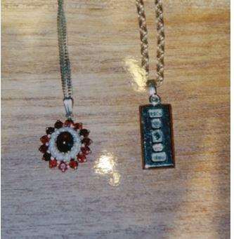 A gold necklace with a rectangular pendant engraved with the words "Queen’s Jubilee" (pictured right), and a gold necklace described as having an outer ring of red garnets, an inner ring of pearls and a larger red garnet in the centre (left) were also stolen. Picture: Kent Police (6746643)