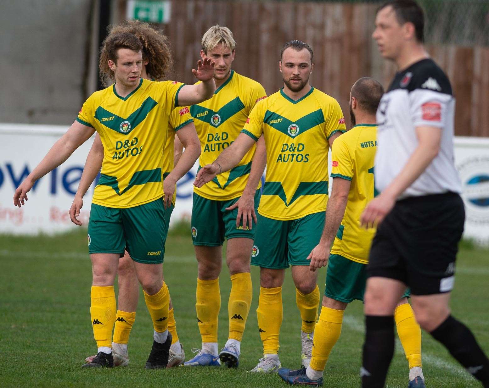 Luke Burdon is congratulated after opening the scoring at Faversham but Ashford went on to lose 3-1 Picture: Ian Scammell