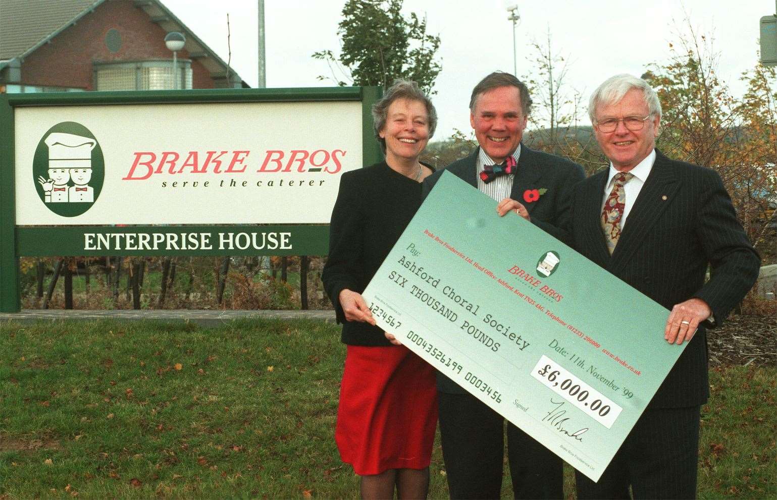 Frank Brake (right) pictured in 2002 outside his company's head office in Ashford