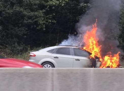 The car fire has closed two lanes of the M25. Picture: @begrudginglee