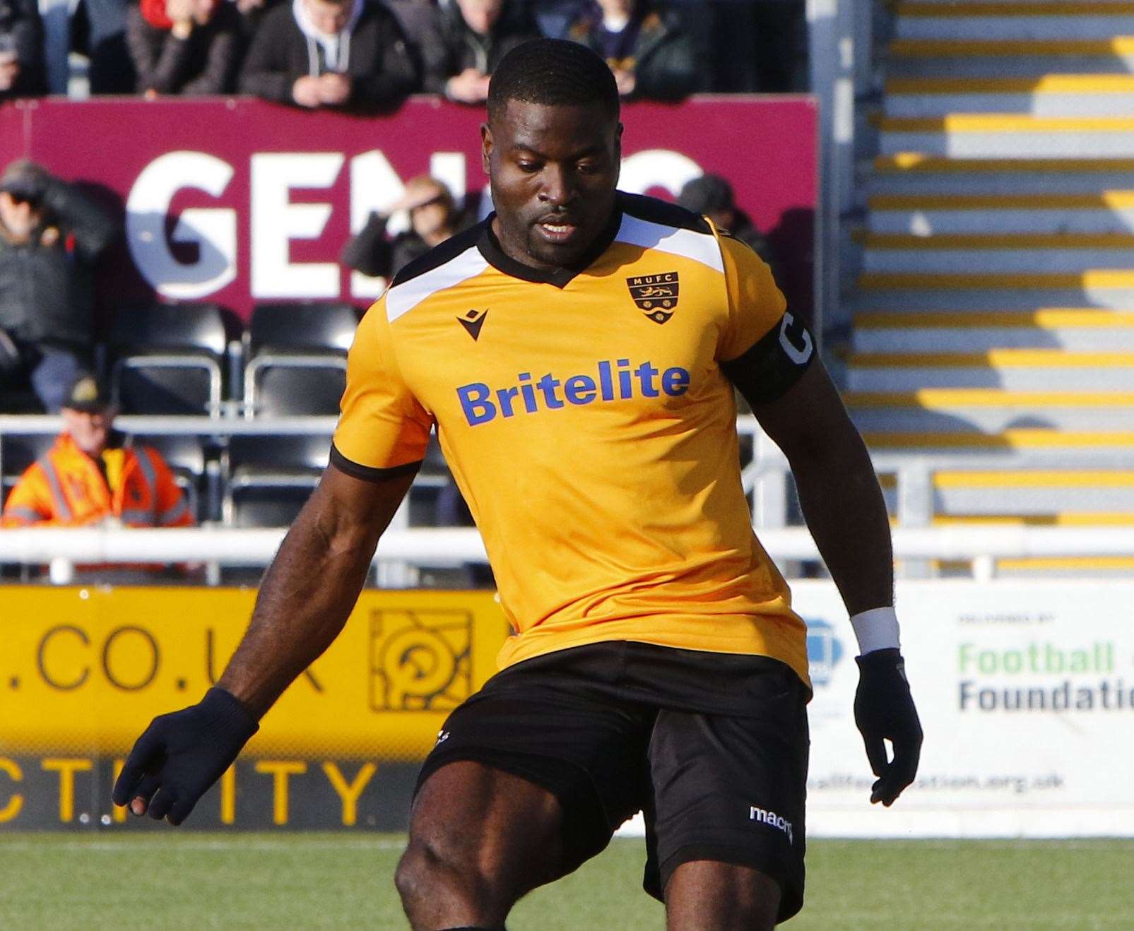 Maidstone United captain George Elokobi was first up in the penalty shoot-out Picture: Andy Jones