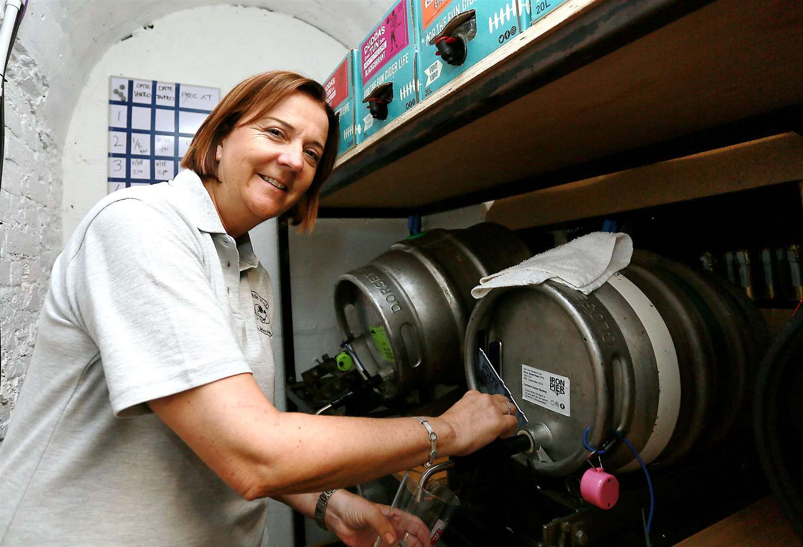 Fiona Norman pulls a pint in the cellar..Picture: Phil Lee .... (15073420)