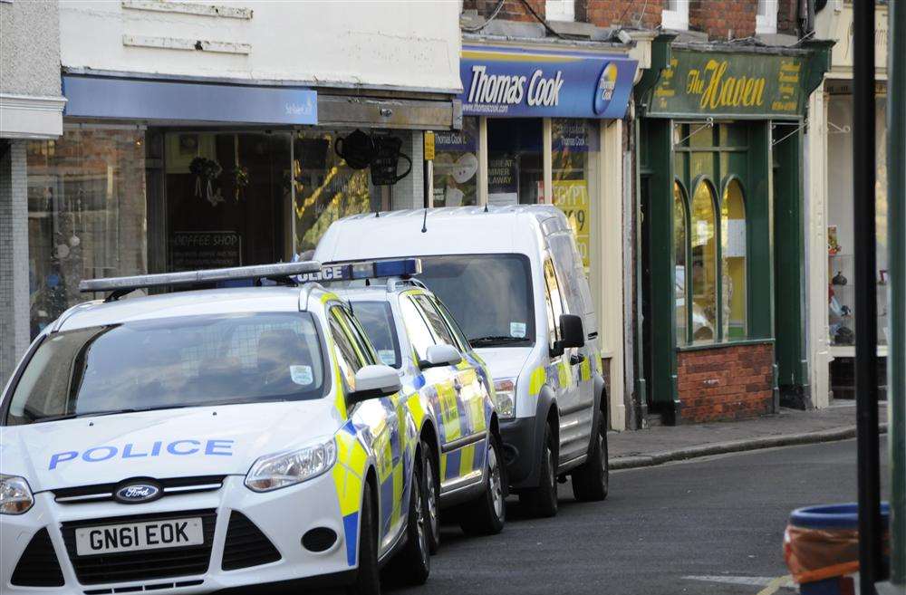 Police cars at the scene of the armed robbery in Sandwich