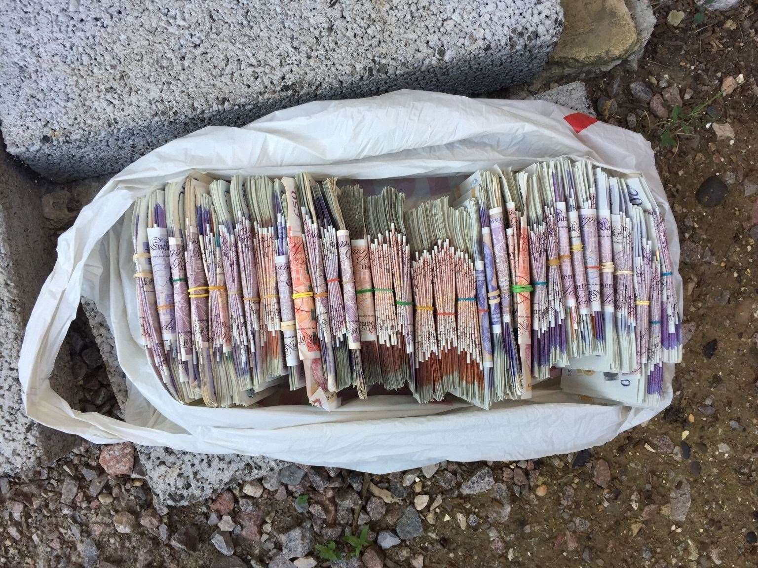 Cash seized in the raids this morning. Picture: Met Police