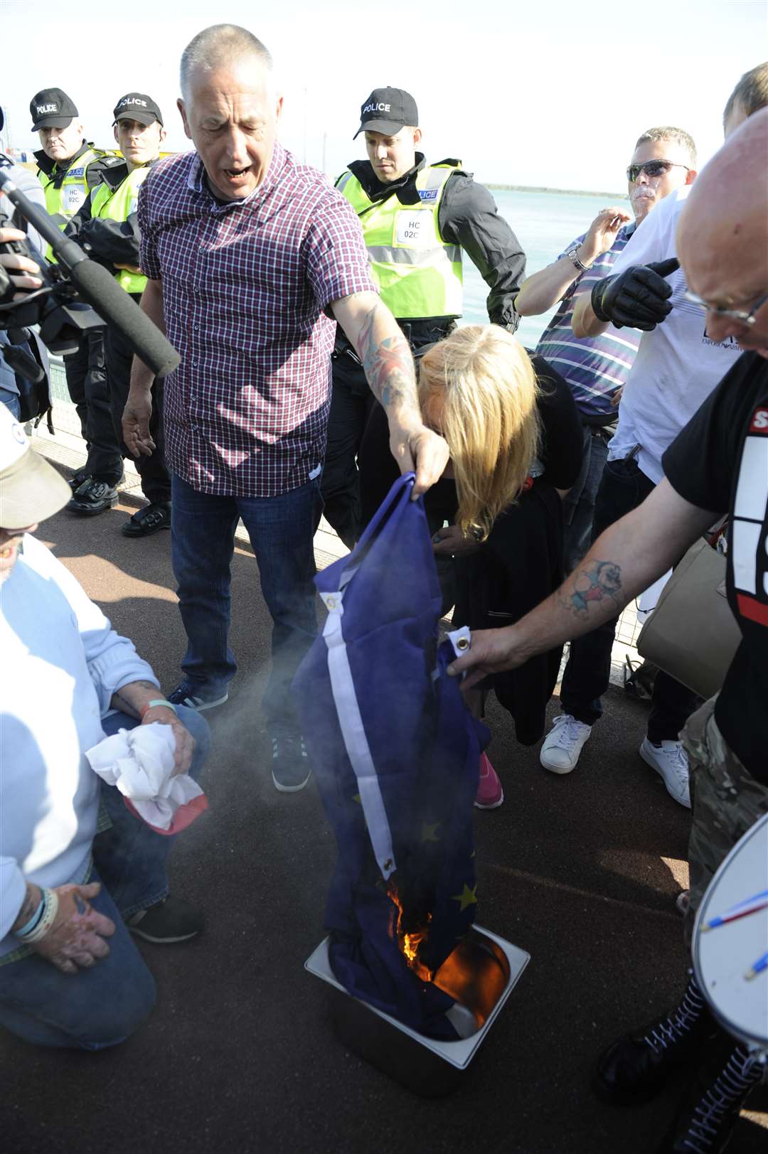 The right wing burned an EU flag during their speeches