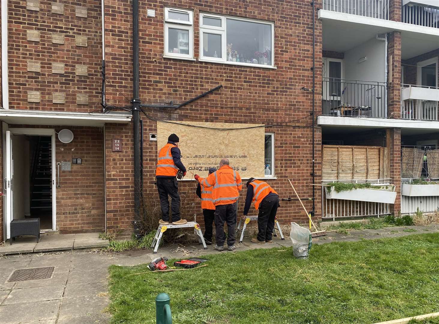 The window of a ground-floor flat has been boarded up in Catlyn Close, East Malling