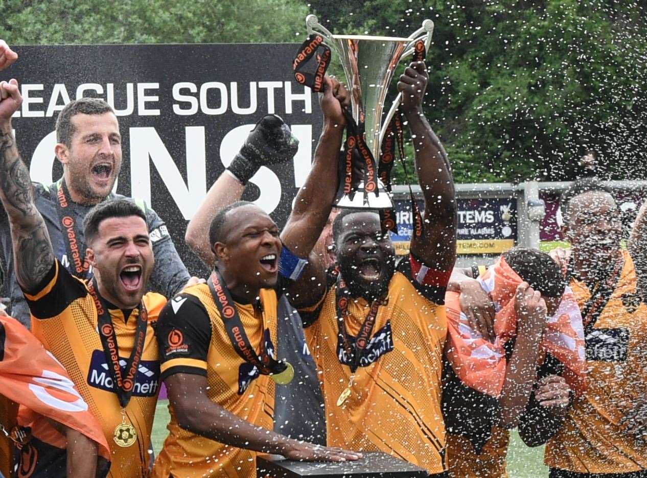 Gavin Hoyte and George Elokobi lift the National League South trophy in 2022. Picture: Steve Terrell