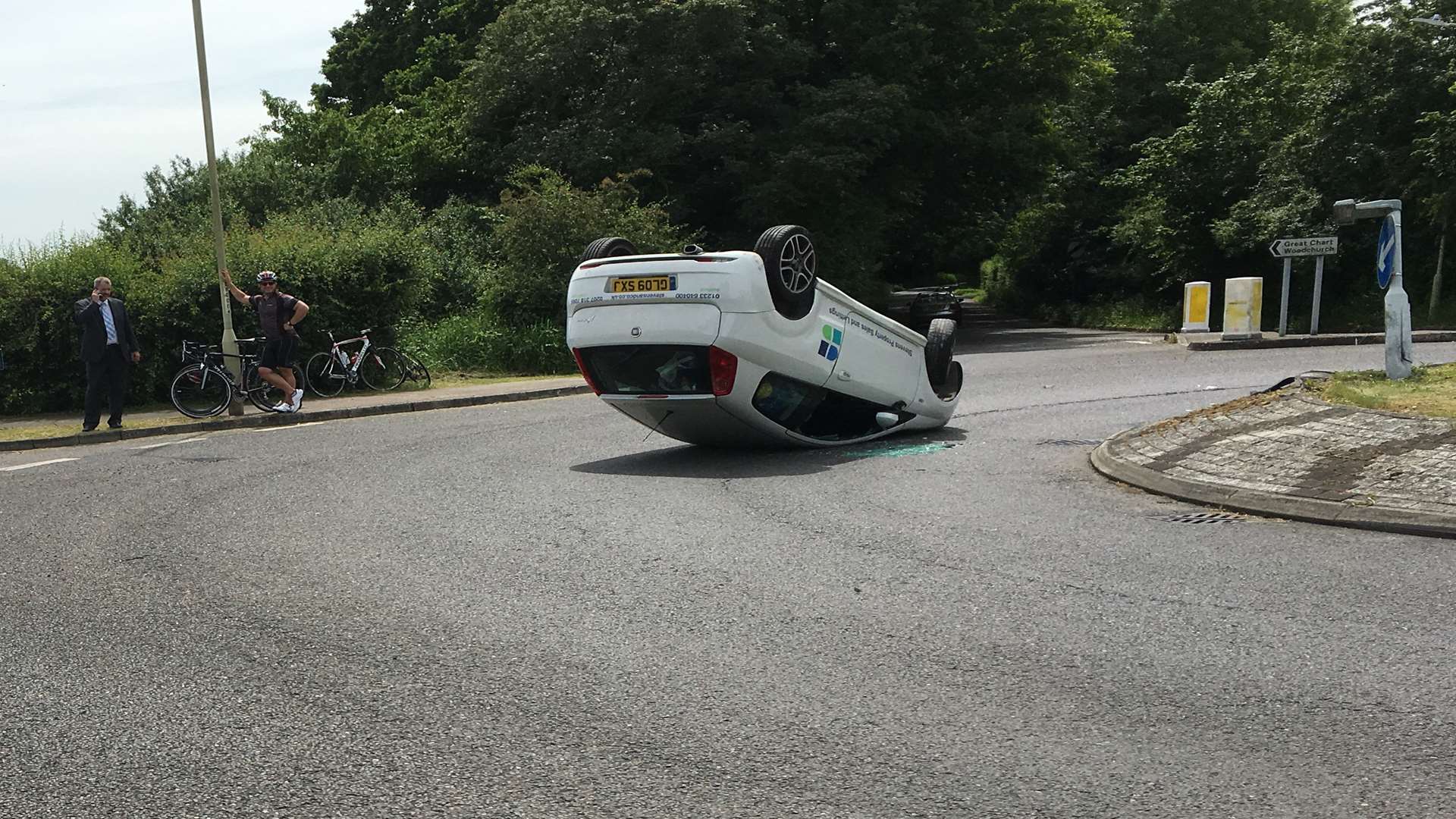 The car flipped onto it's roof. Pic: Alex Stout from Club Grappa Ashford cycling club