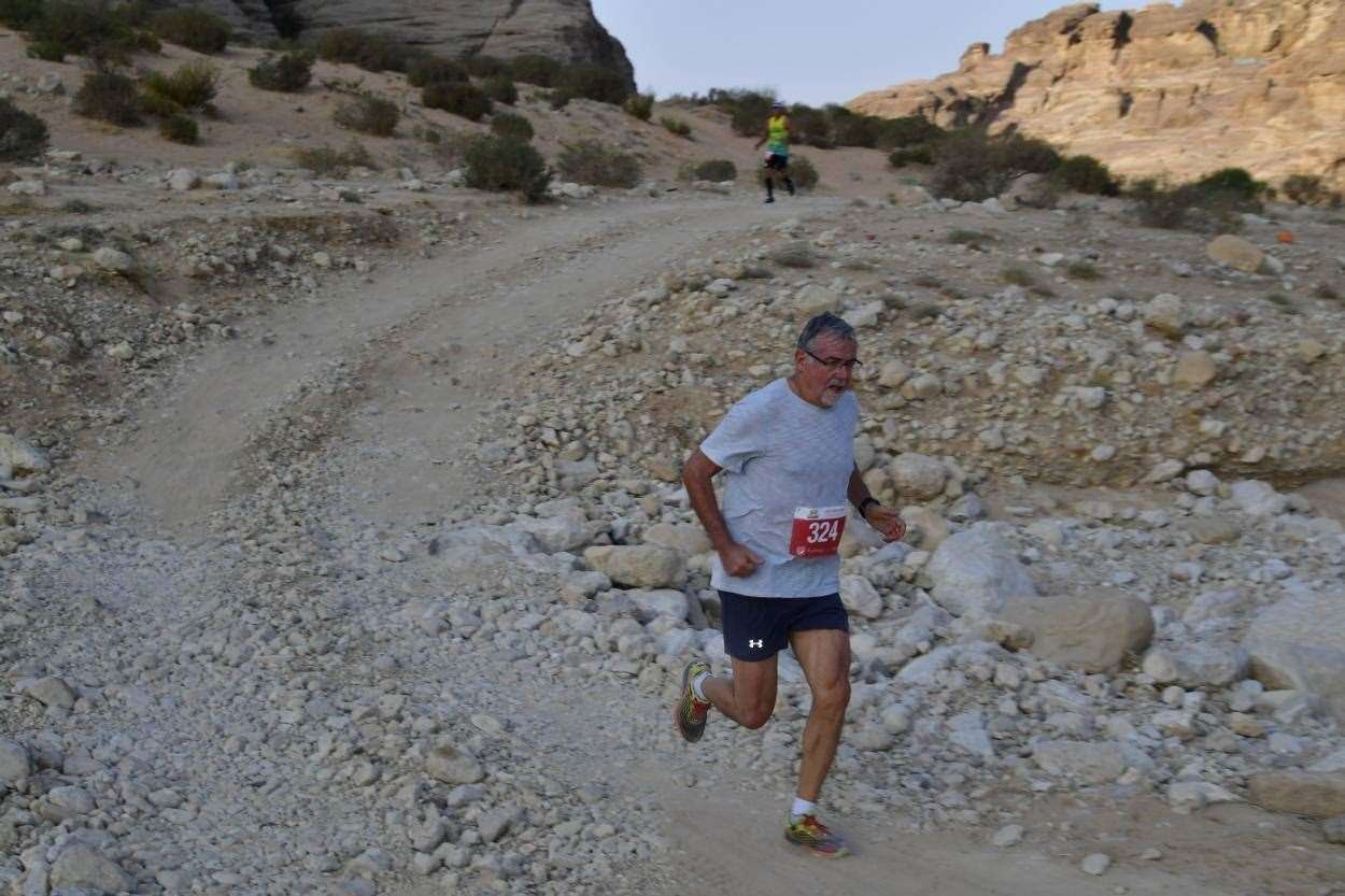 Mike Gratton competing in a desert half marathon in Jordan