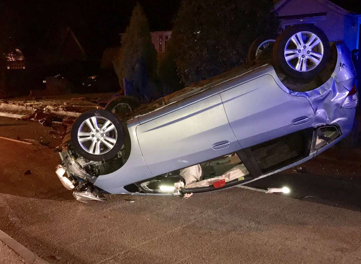 The overturned car in Lower Green Road Photo: Bobby Bewl
