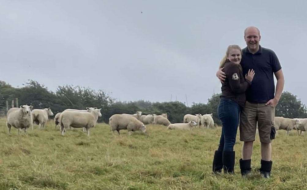 Owner Joe with partner Millie tending to their flock Picture: Joe Cain