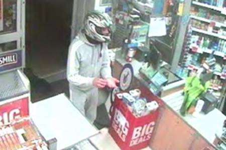 Police are hunting this man after a robbery at the Co-operative in Pattens Lane, Chatham