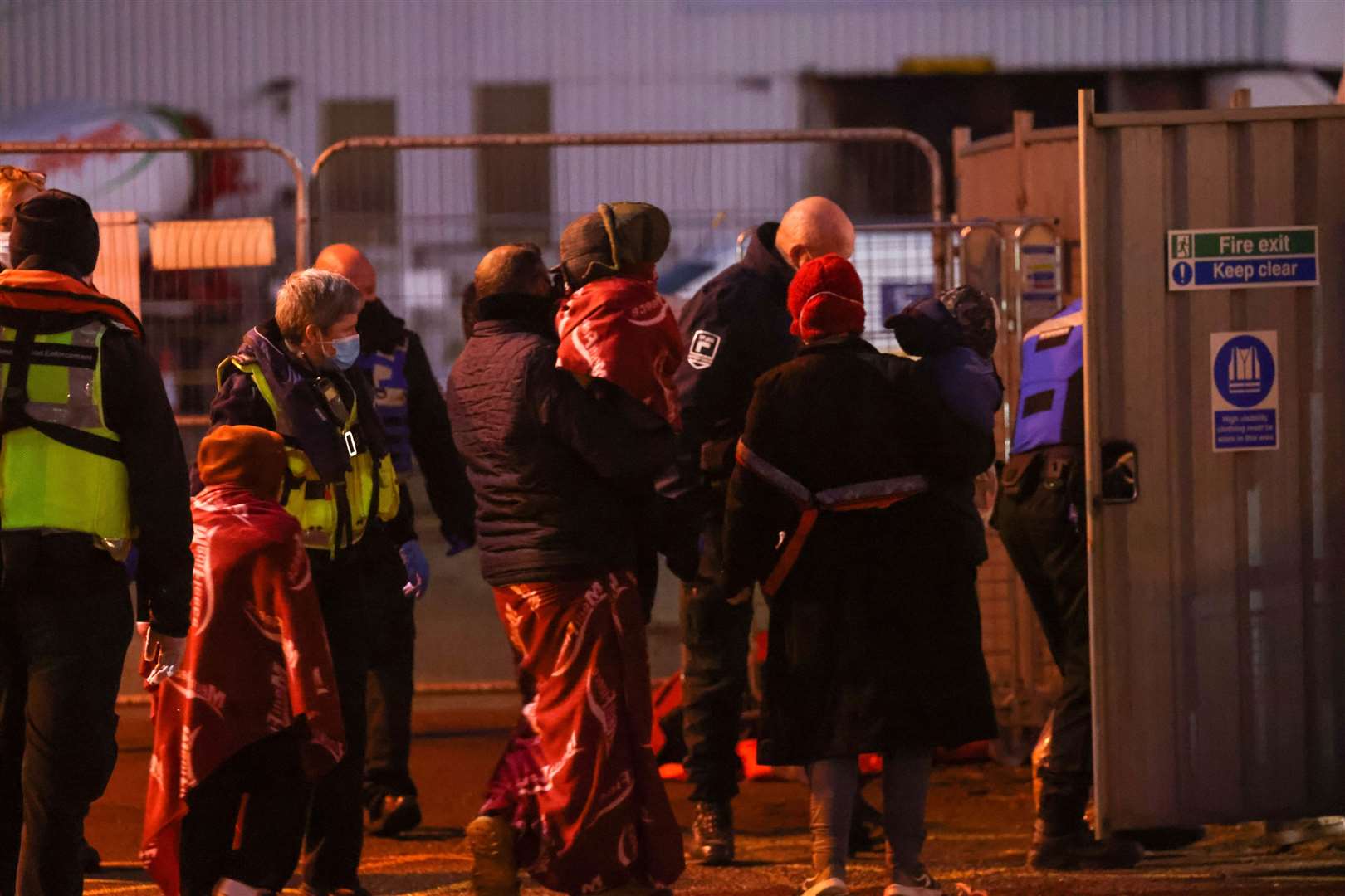 Migrants and their children arriving at Dover. They were picked up by the Border Force boat Hurricane near Ramsgate. Photo: UK News In Pictures