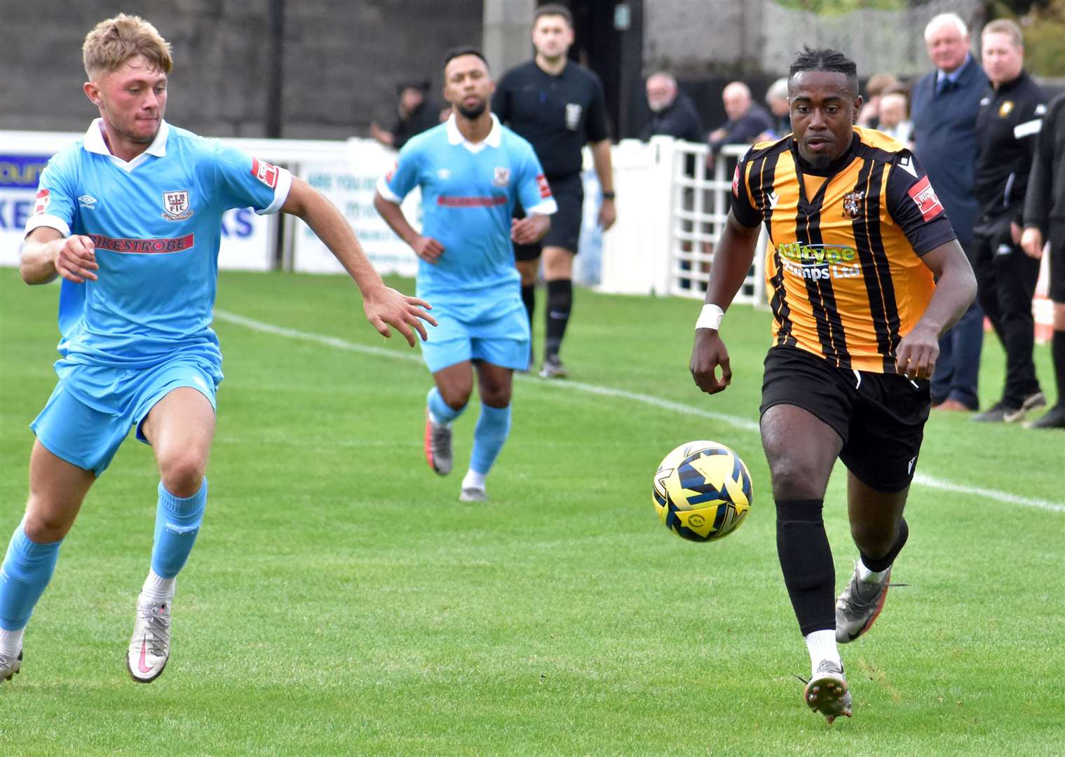 Folkestone's Ira Jackson, right, runs down the wing against Potters Bar. Picture: Randolph File