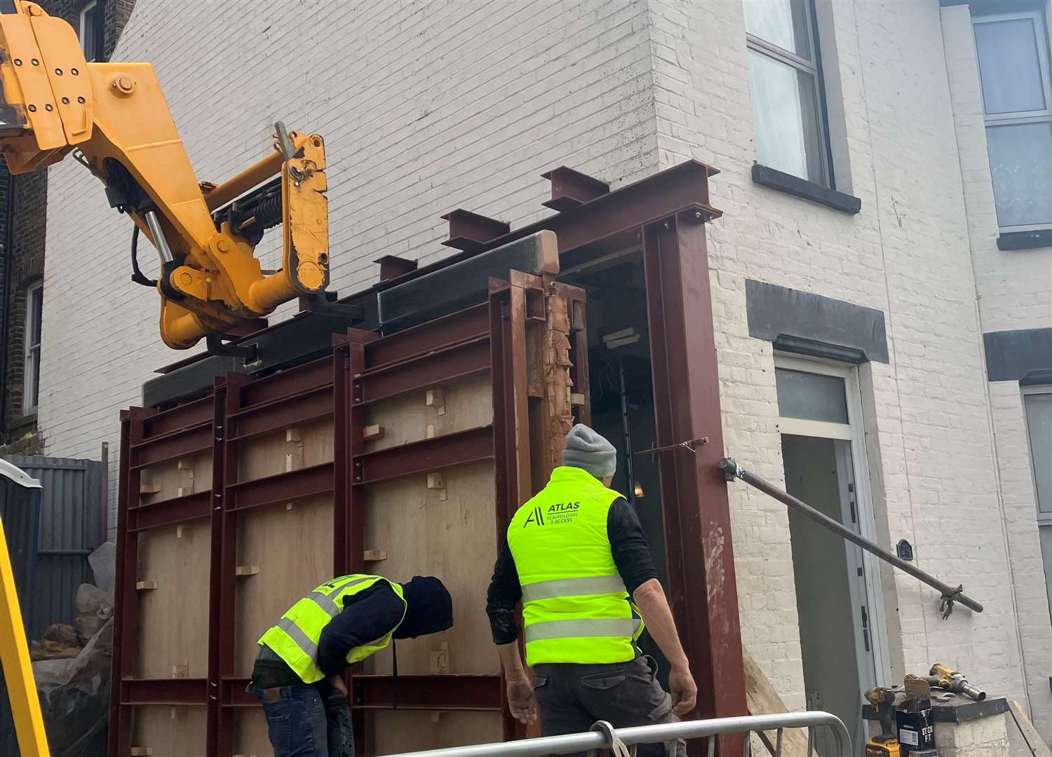 The Banksy artwork being removed from the Margate home. Picture: Bread and Butter PR