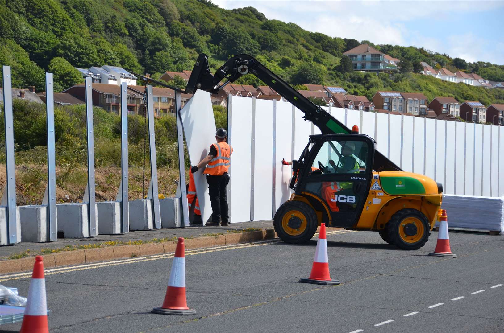 Hoardings being put up around the site of Princes Parade in Hythe. Picture: Folkestone and Hythe District Council