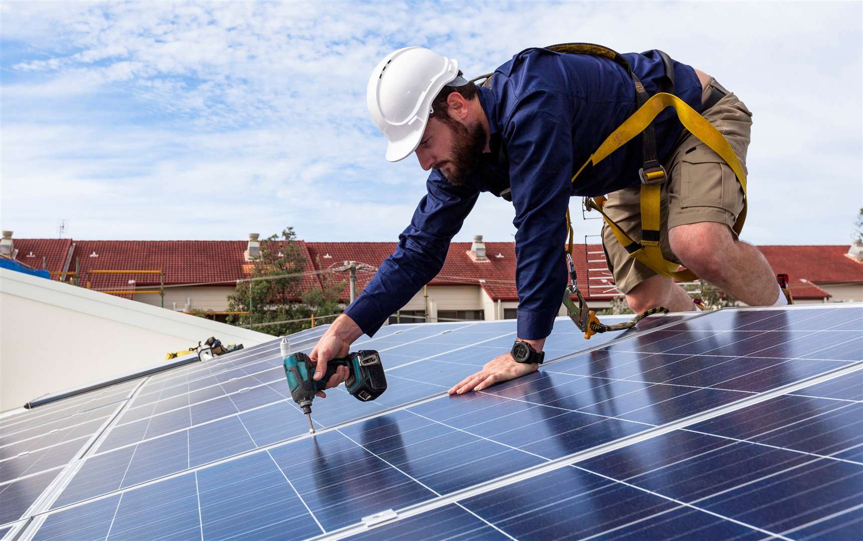 Fixing more solar panels to roofs is encouraged – but economies of scale mean only the building they are on will likely benefit