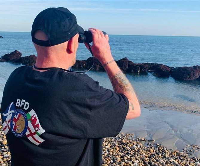 A Britain First member on beach patrol in Dover. Picture: Britain First