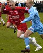 Ben Lewis (left) in action for Welling against Grays in February. Picture: NICK JOHNSON