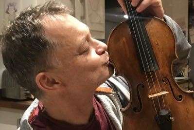 Stephen Morris was reunited with his £250,000 violin. Picture: Stephen Morris