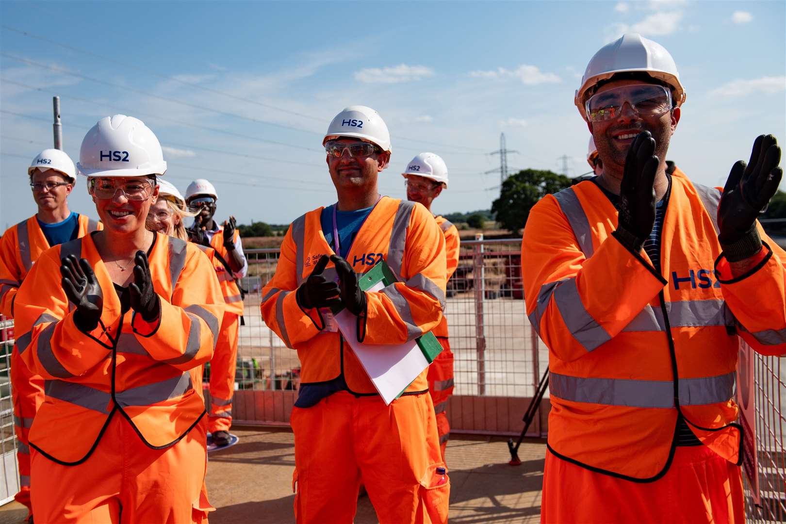 HS2 workers applauded as the bridge was moved into place (Jacob King/PA)