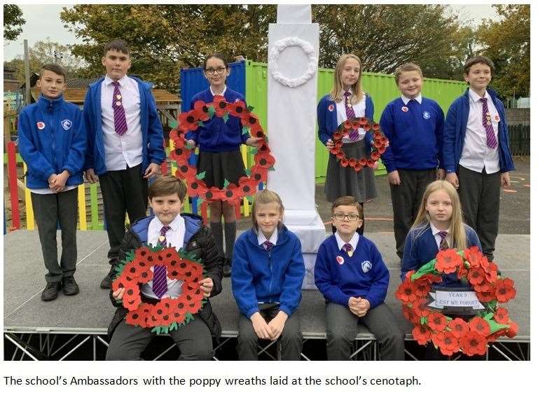Pupils at Minster Primary School in Brecon Chase had their own cenotaph for their Remembrance Day wreath-laying. They all made poppies and fixed them to a fence in the playground