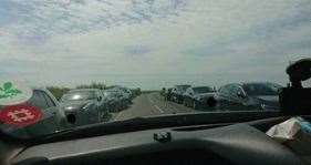 Cars were parked both sides of the road on the approach to the White Cliffs of Dover. Picture Kent Police-Dover twitter