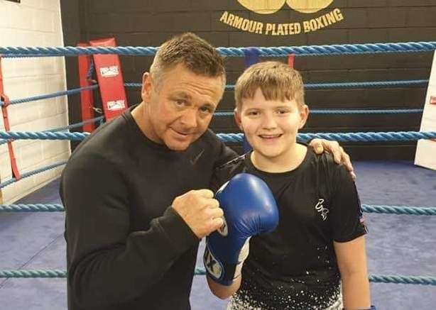 Former world champion Johnny Armour with a young hopeful